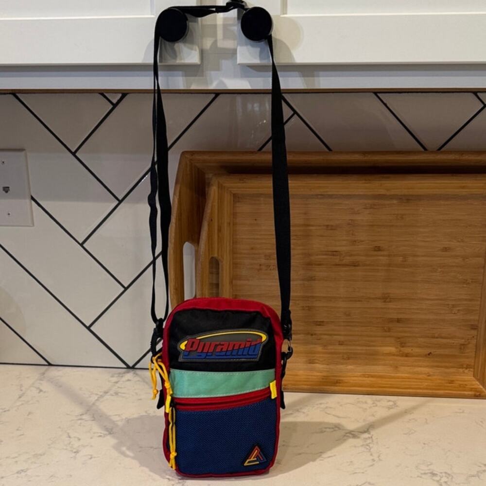 Black Pyramid orbit logo retro crossbody bag colorful everyday hiking Gorpcore